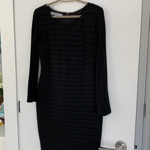 Dress for occasion, fitted, very comfortable, form hugging, black jersey, lined